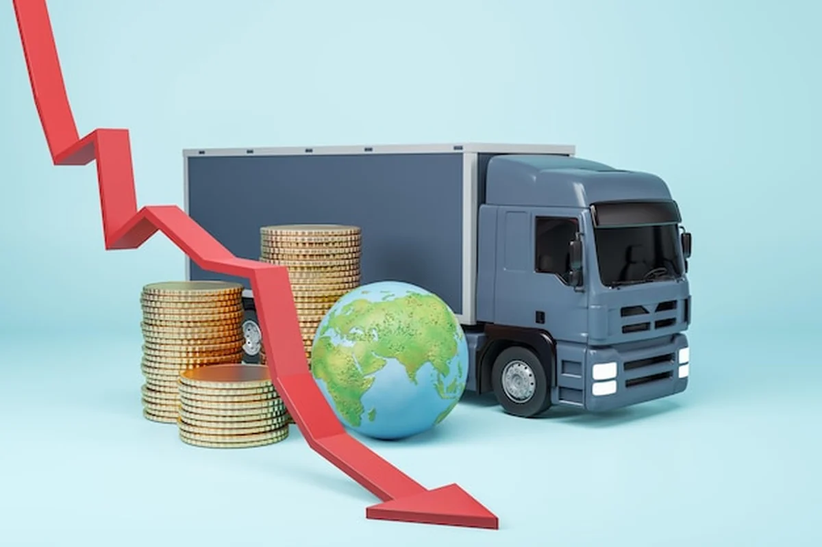 Szare ciężarówki z monetami i Ziemią na niebieskim tle